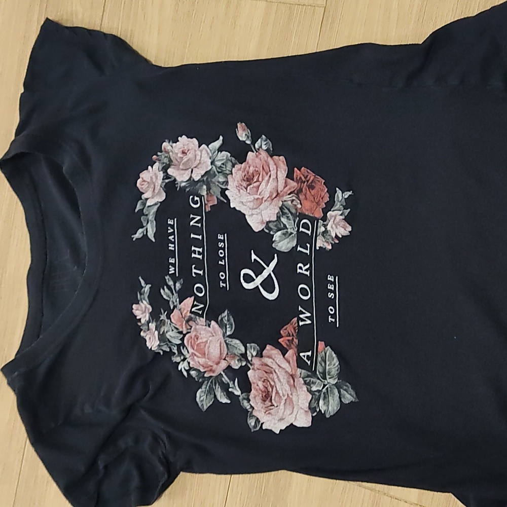Black Tshirt, has been worn many times but still in good condition.